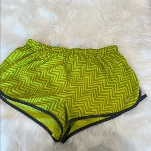 Like green Nike running shorts
